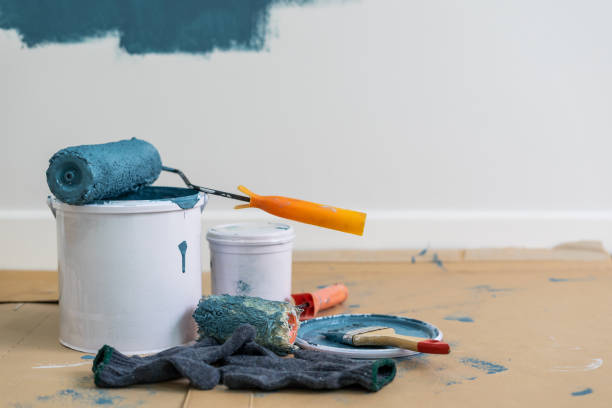 istock Paint bucket with roller, glove and brush 896228872