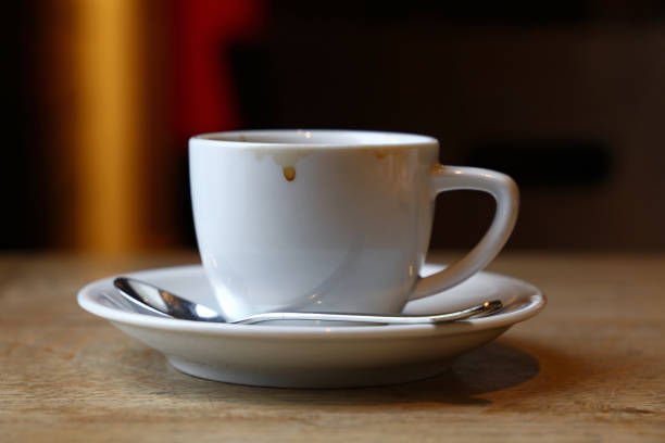 istock Close up white cup of black coffee on table 896229134