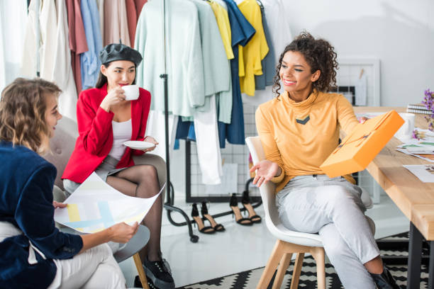 istock multiethnic fashion designers working together 896229214