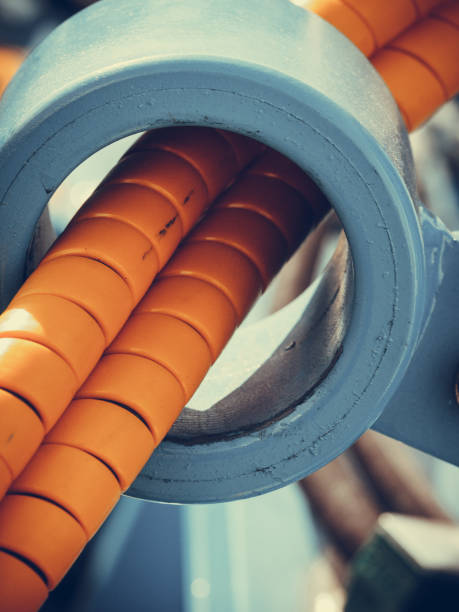 istock Tube wires in orange rubber cover casing 896241316