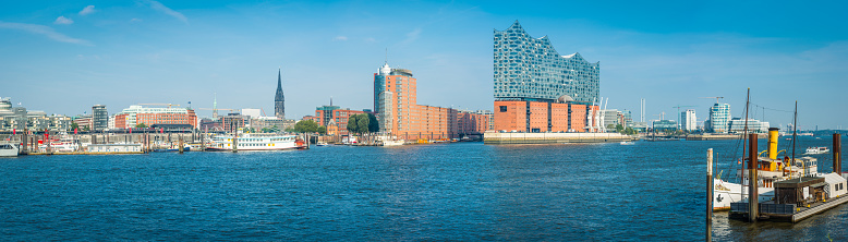 Panoramic view across the Elbe and Port of Hamburg to the marinas and modern redevelopments of Hamburg’s waterfront, Germany.