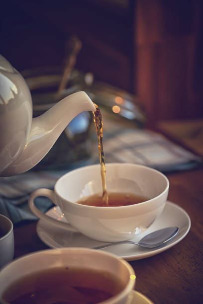 istock Cup of Black Tea Served with Biscuits 896259316