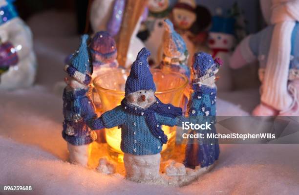 Cozy Christmas Snowmen Stock Photo - Download Image Now - Blue, Bright, Candle