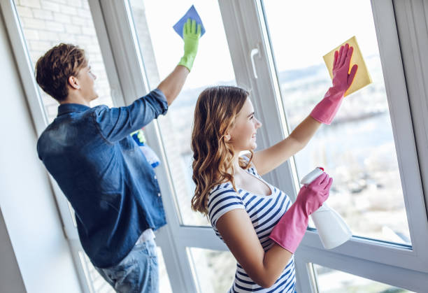 istock Couple is doing cleaning at home. 896260048