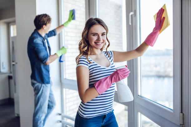 istock Couple is doing cleaning at home. 896260060