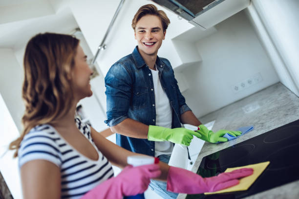 istock Couple is doing cleaning at home. 896260146