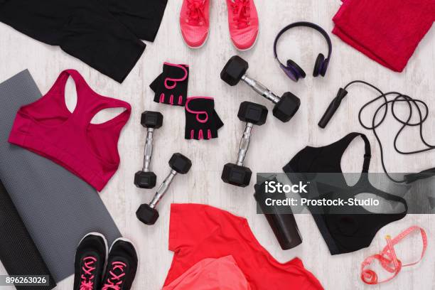 Female Sport Clothing And Equipment Top View Stock Photo - Download Image Now - Sports Clothing, Shopping, Gym