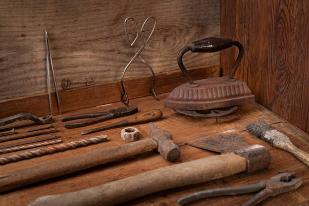 istock Collection of vintage tools on a blue wooden background 896269938
