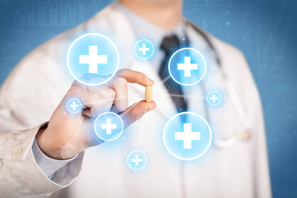 istock A doctor showing a pill with crosses 896269952