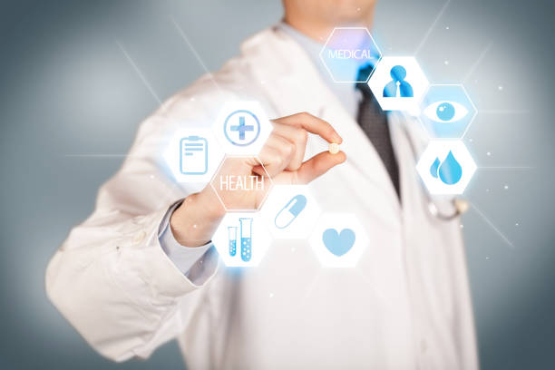 istock A doctor in white holding a pill 896270000