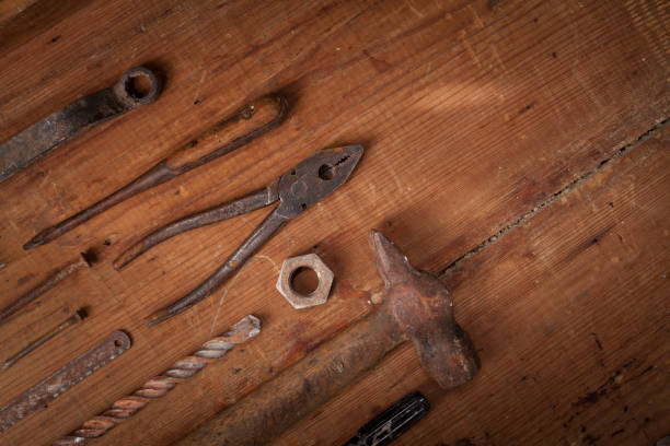 istock Collection of vintage tools on wooden background 896270286
