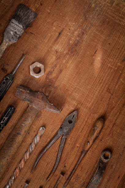 istock Collection of vintage tools on wooden background 896270404