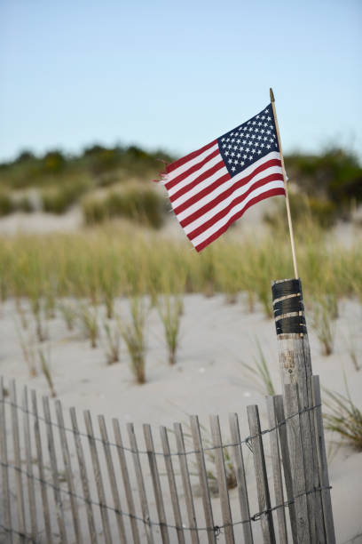 istock American flag on the beach, Cape May, New Jersey 896273258