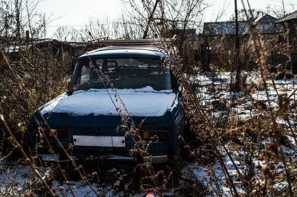 istock Broken disassembled machine in the dump. The car died 896273712