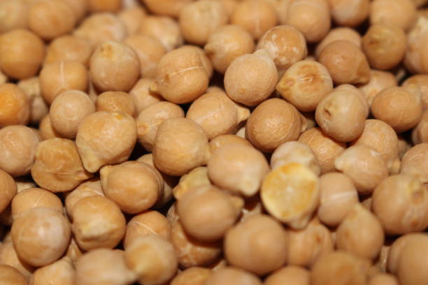 istock Pile of chick peas 896277936