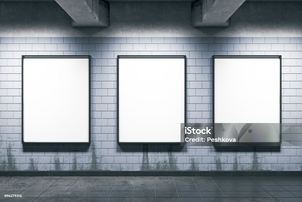 Metro station with empty posters Grunge metro or subway station with empty posters wall. Mock up, 3D Rendering Subway Stock Photo