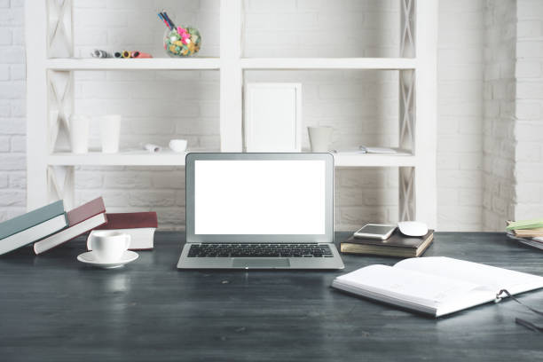 istock Hipster office desktop with empty laptop monitor 896287902