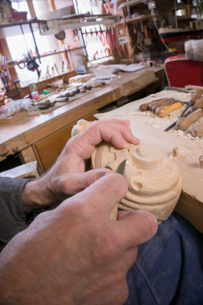istock Wood carving close-up of hand 896287904