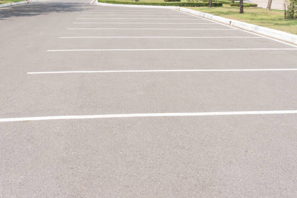 istock Empty Space in a Parking Lot / Empty space parking lot outdoor in public park. 896288202