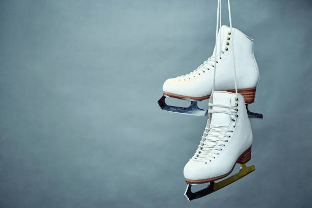 istock Women's skates with laces on a gray background. 896316566