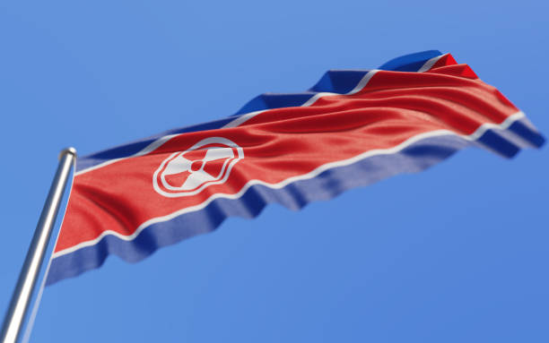 istock North Korean Flag Waving With Wind On Blue Sky 896319212