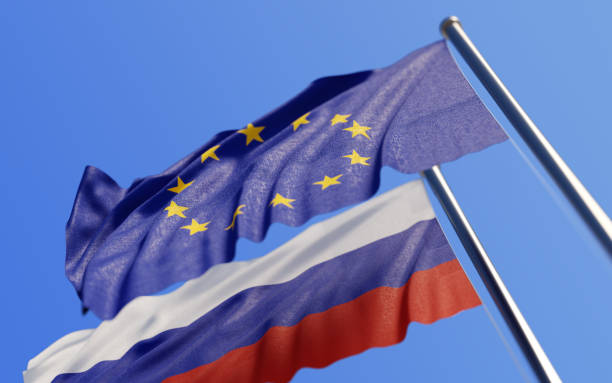 istock European Union And Russians Flags Waving With Wind On Blue Sky 896319368