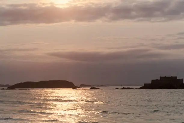 Photo of The coast of Saint Malo at sunset, in the Normandy/France.