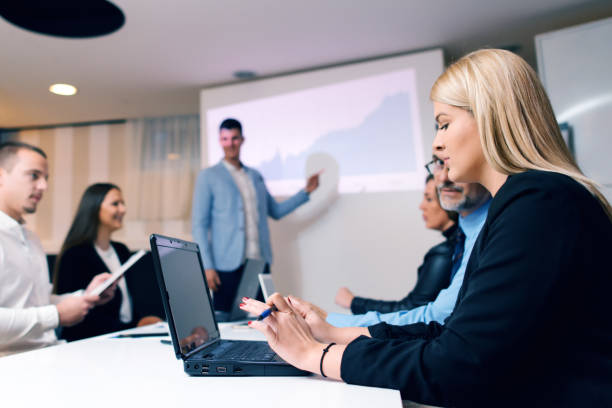 istock Businessman presenting to colleagues at a meeting 896339860