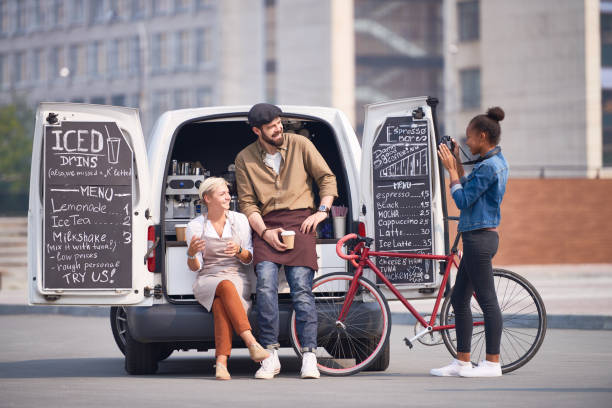 istock Barista team selling coffee outdoors 896355652