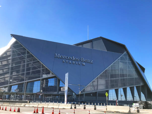 Mercedes Benz Stadium in downtown Atlanta Atlanta, Georgia, USA - December 13, 2017: Mercedes Benz Stadium in downtown Atlanta, Georgia. The stadium is a brand new multi-functional retractable roof architecture and serves as home for the Atlanta Falcons of the National Football League. It is open to games on August 26, 2017. georgia football stock pictures, royalty-free photos & images