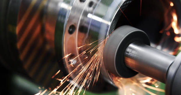 istock Finishing metal working on high precision grinding machine in workshop 896359408