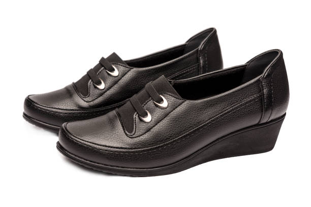 istock Black female shoes isolated on a white background 896361936
