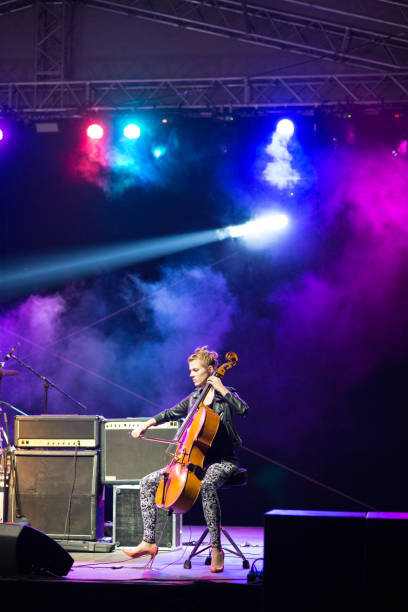 istock Woman playing cello on the concert 896369098