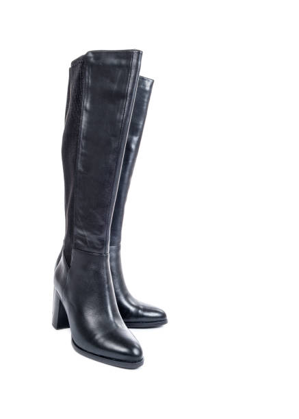 istock Women's Knee High Black Leather Boots 896374554