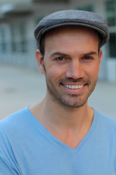 istock Man showing his perfect white smile 896378018