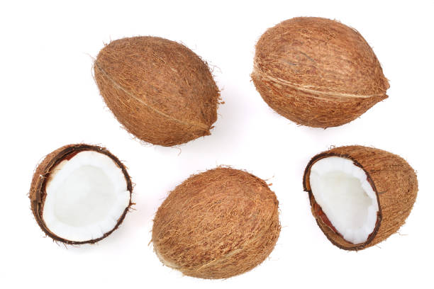 istock whole coconut with half isolated on white background. Flat lay. Top view 896386324