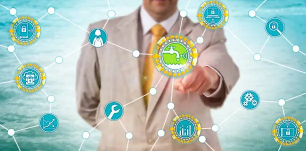 Unrecognizable manager accessing data on water usage. Industry concept for efficient water management, wastewater engineering, system analysis, sustainability and protection of natural resources.