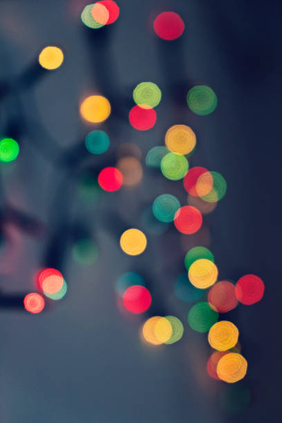 istock Blurred background with multicolored lights of garland 896419328