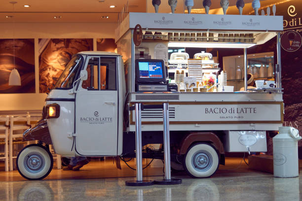 Ice cream truck inside the lobby of Guarulhos International Airport. stock photo
