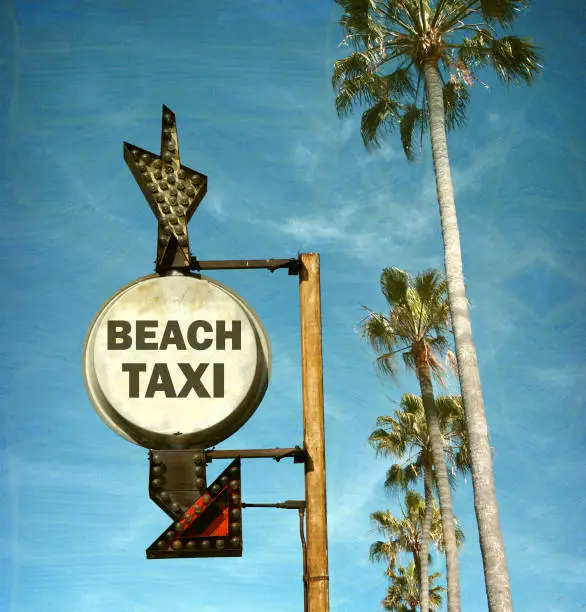 Photo of beach taxi sign