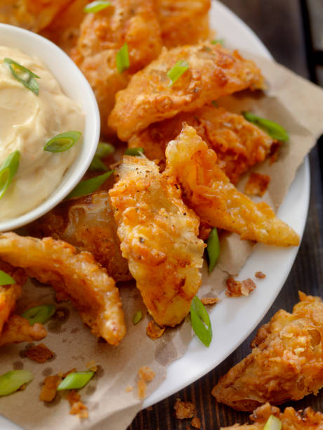 istock Deep Fried Onion Petals with Dipping Sauce 896436456