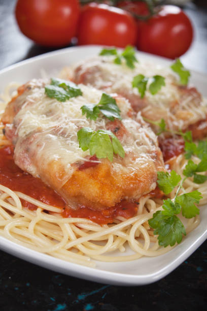 istock Chicken parmesan with spaghetti pasta 896439960