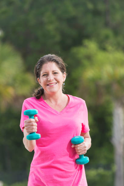 istock Mature Middle Eastern woman exercising outdoors 896455348