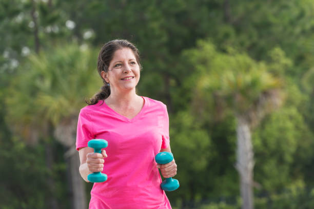 istock Mature Middle Eastern woman exercising outdoors 896455478