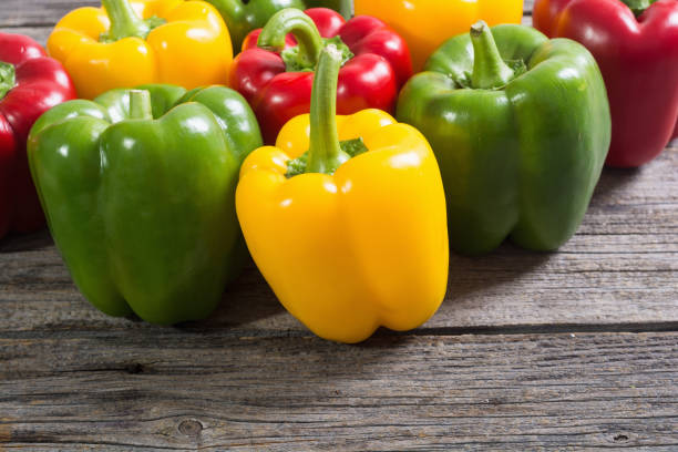 istock Colorful green , red and yellow peppers 896455618