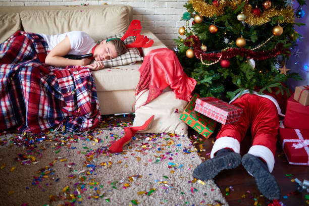 istock Exhausted friends sleeping after Christmas party 896458224