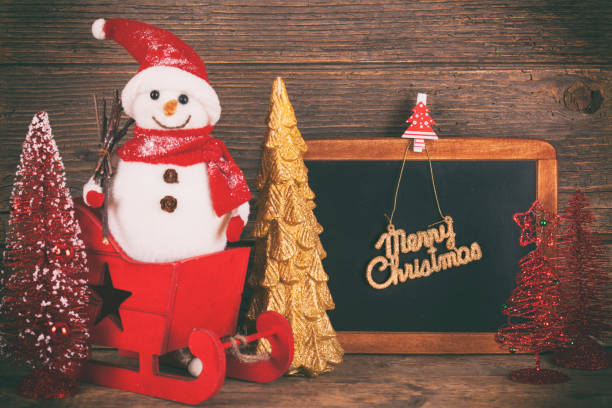 istock Blackboard with Christmas decoration on wood over rustic background with copy space for text 896460998