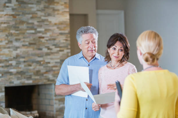 istock Real estate agent with prospective buyers 896461036