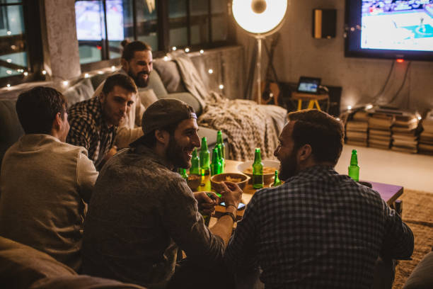 istock Weekends are for watching their favourite sport 896466572