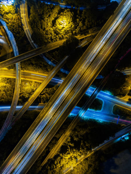 istock Aerial highway junction at night time 896492082